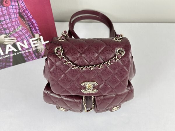Chanel 24A Burgundy Caviar Medium Duma Backpack.