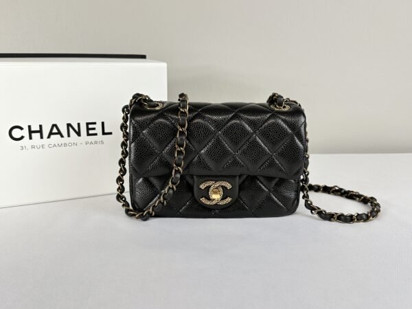 Chanel 24B Black Coco Caviar Square Mini with Bronze Hardware.