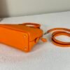 Hermès Orange Chevre Mini Bolide with Palladium Hardware.