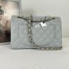 chanel 23B Grey Caviar Small Classic Flap with Champagne Gold Hardware.