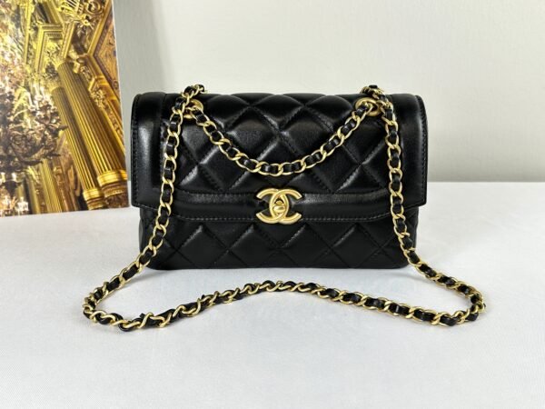 Chanel 25P Black Lambskin Flap Bag.